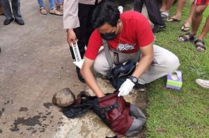 Jasad Pria Ditenggelamkan dengan Batu ke Sungai  